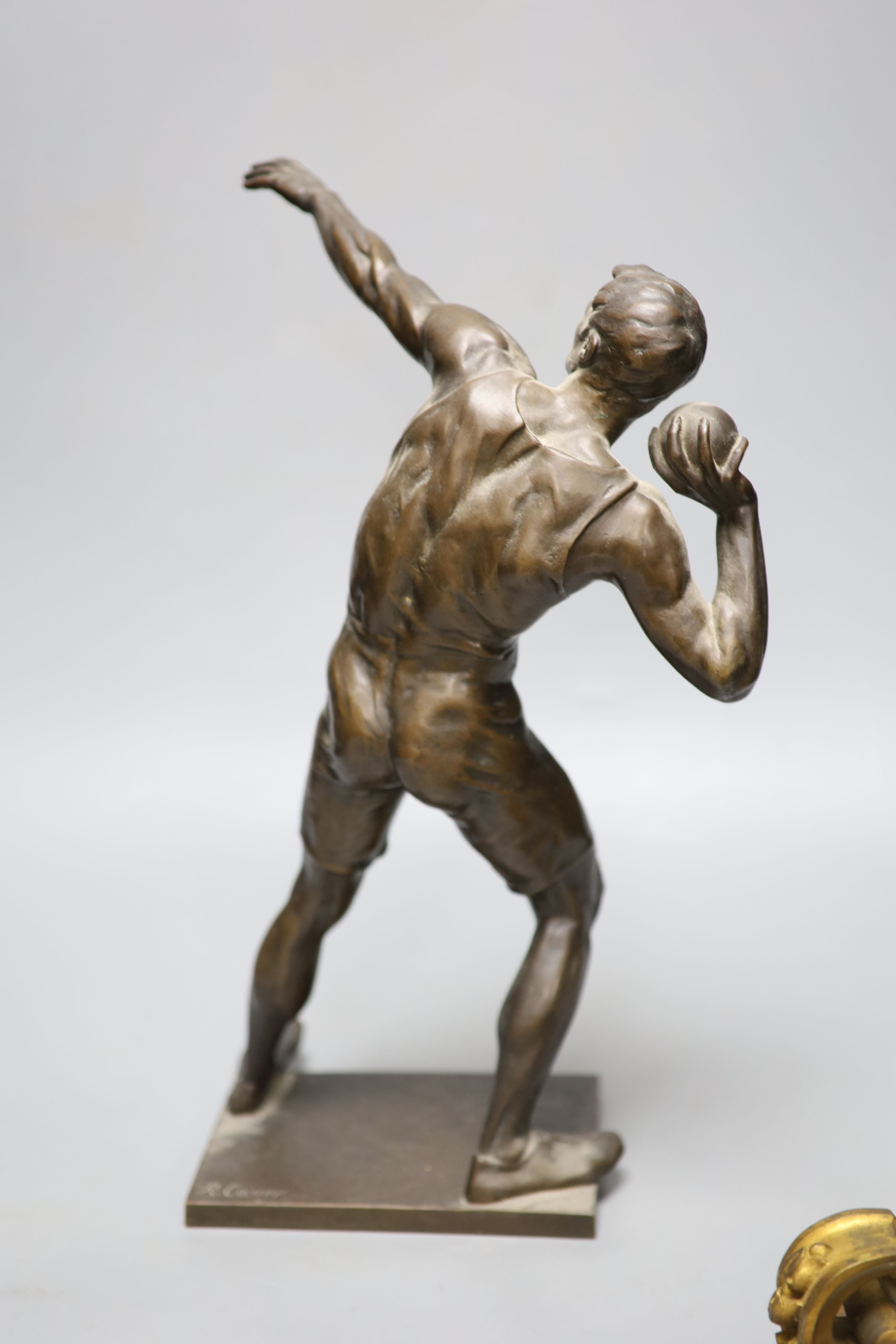 After Robert Cauer (1863-1947) a bronze figure of a shot-putter, c.1925